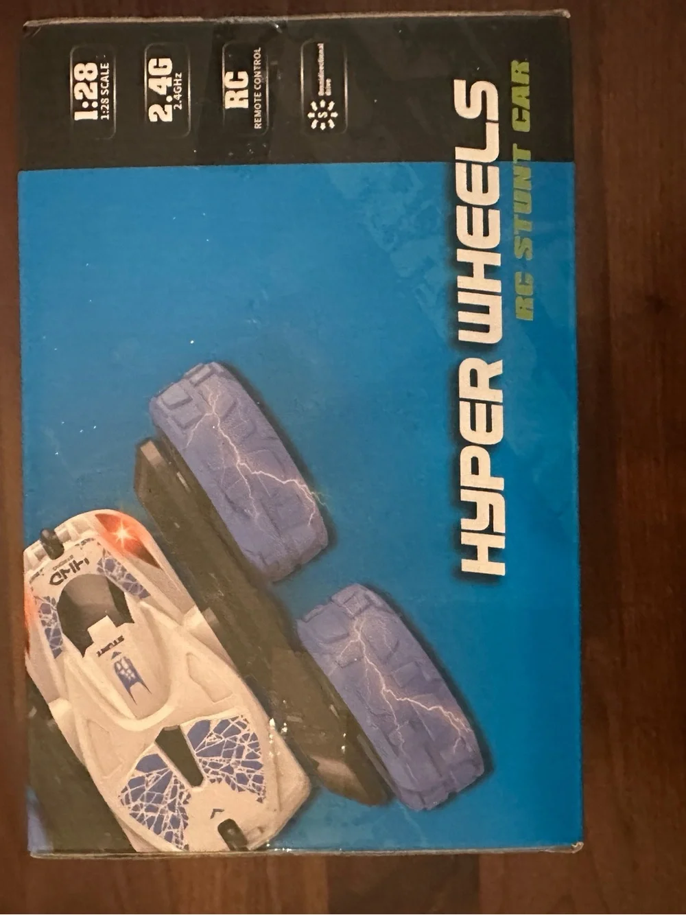 Never opened, NWT  Hyper Wheels RC Stunt Car - Blue with Green Wheels